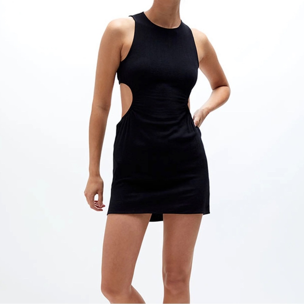Mini black dress, open back